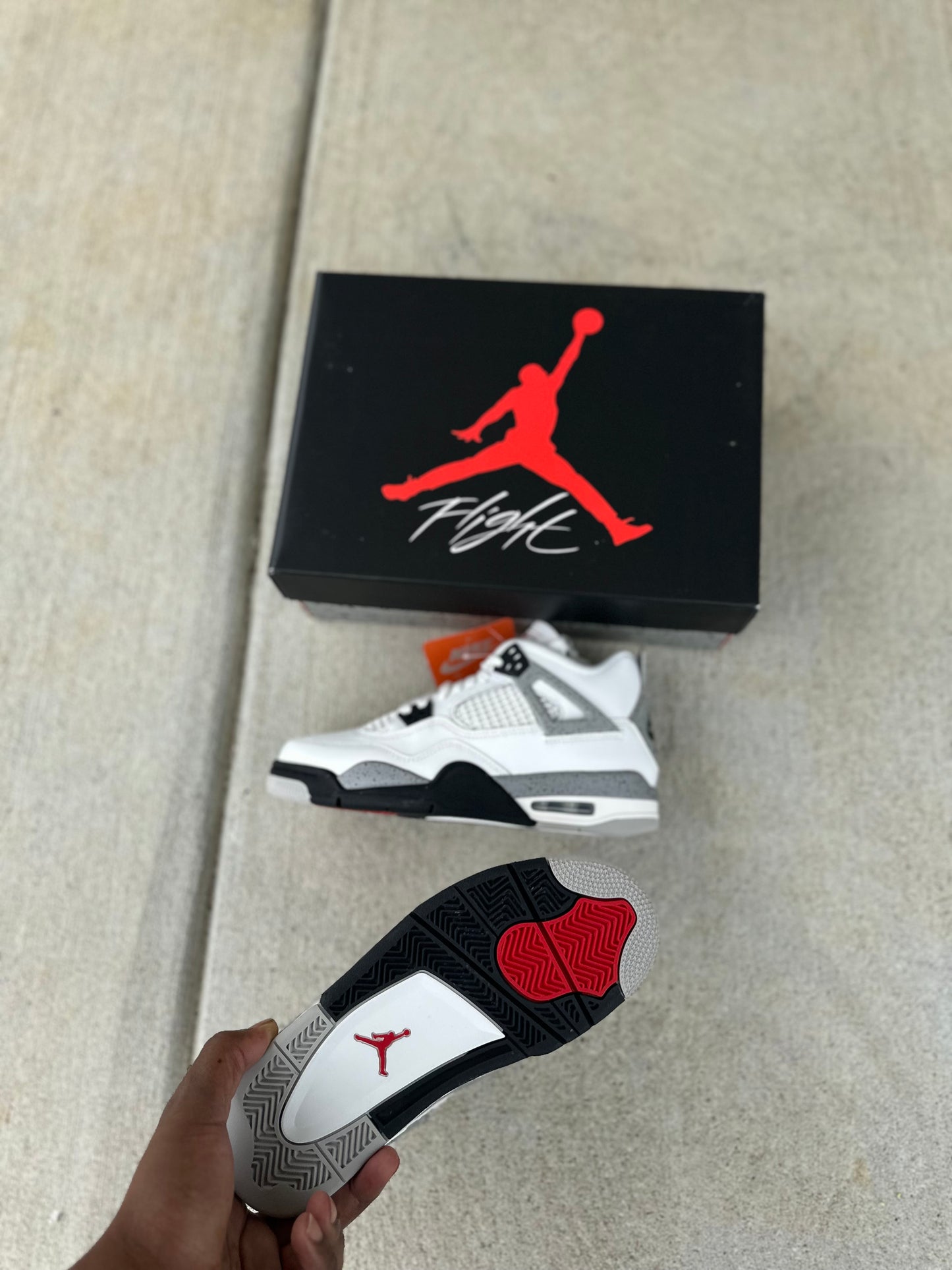Jordan 4 Retro “White Cement” (2025)
