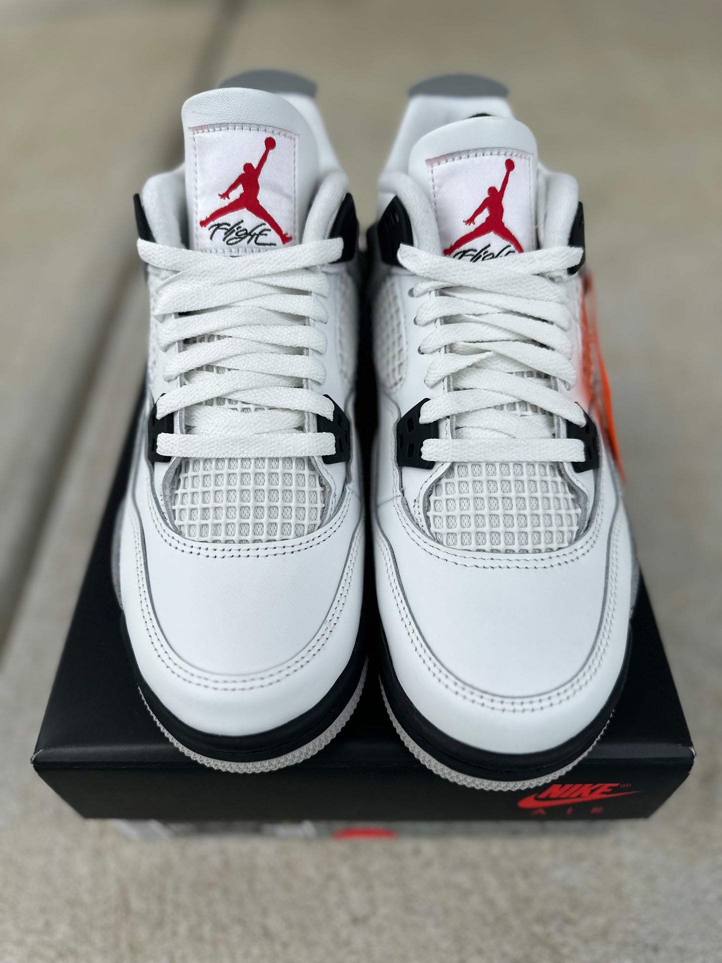 Jordan 4 Retro “White Cement” (2025)