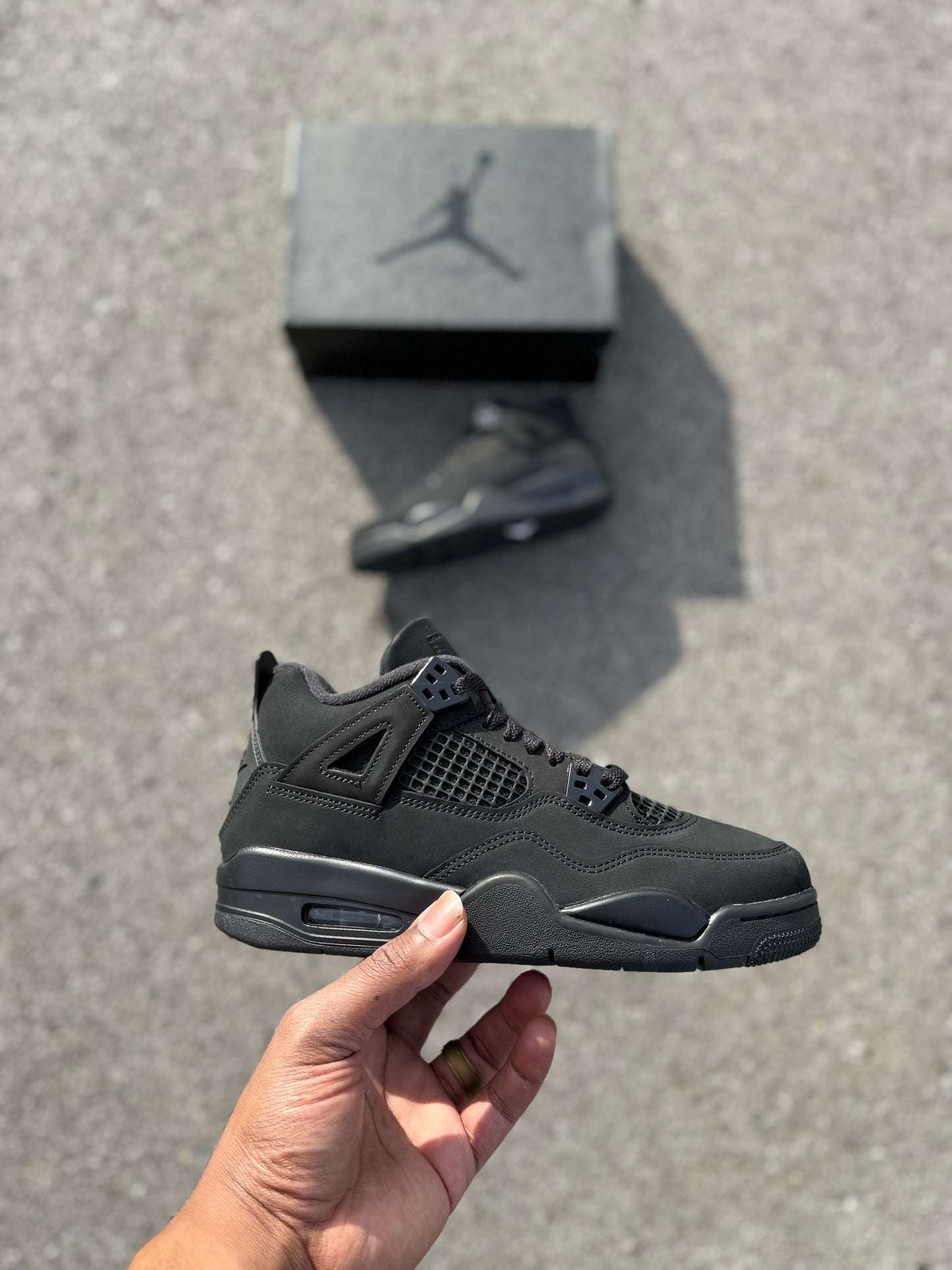 Jordan 4 Retro “Black Cat” (2025)