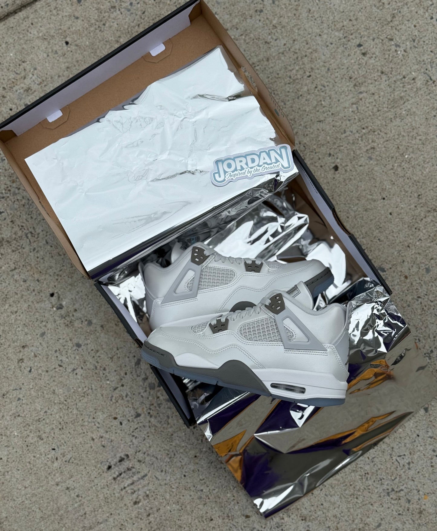 Jordan 4 Retro “Photon Dust Blue Chill”