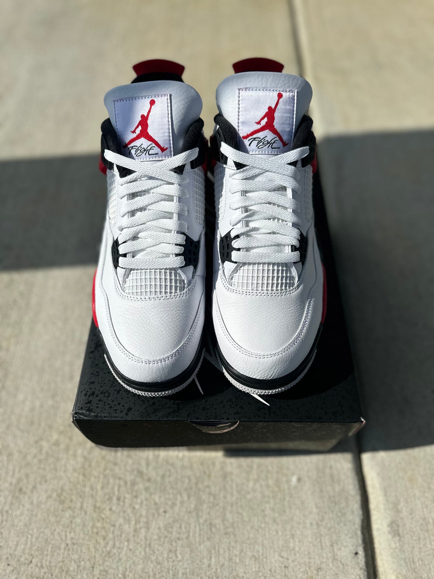 Jordan 4 Retro “Red Cement”