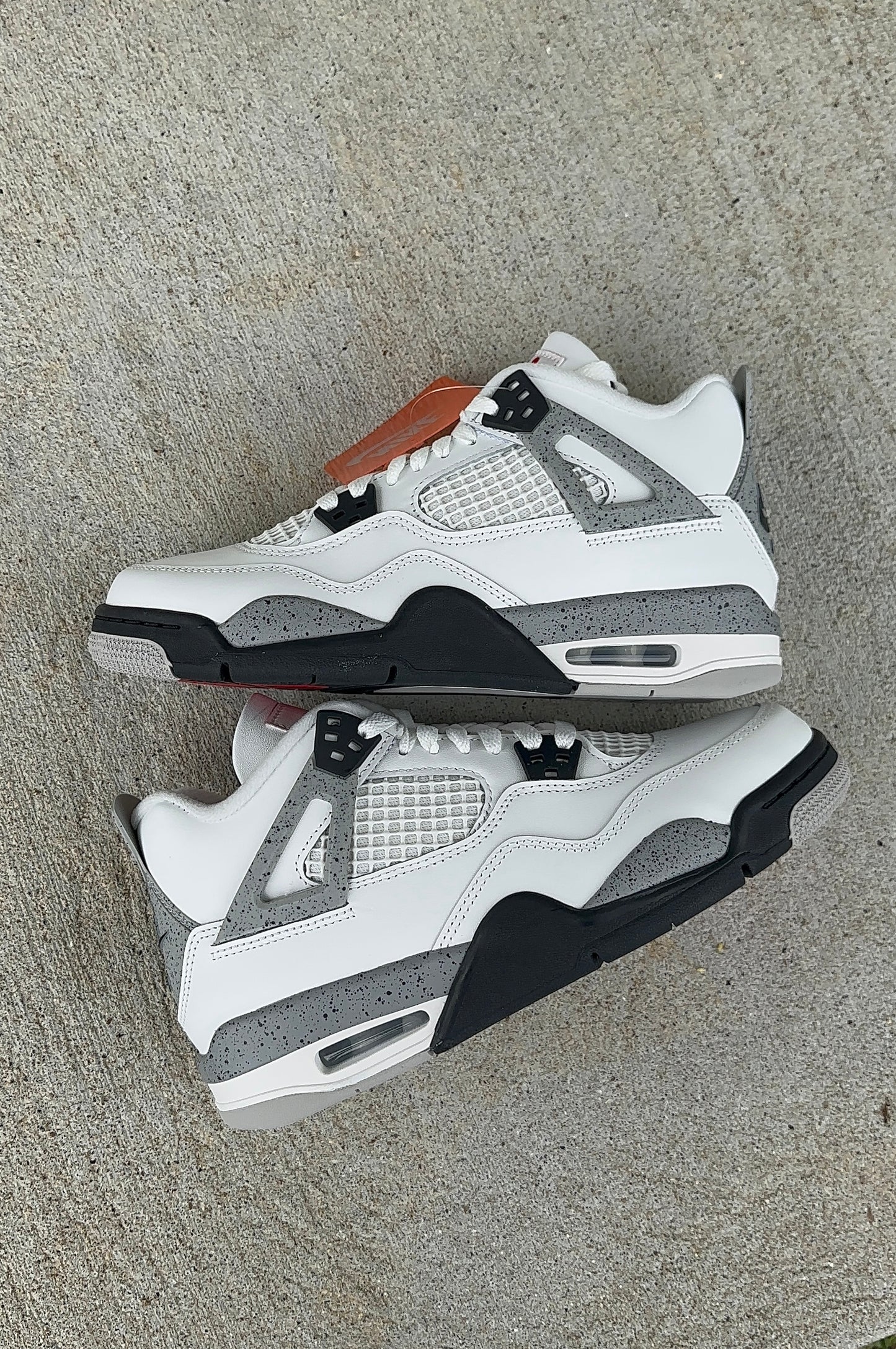 Jordan 4 Retro “White Cement” (2025)