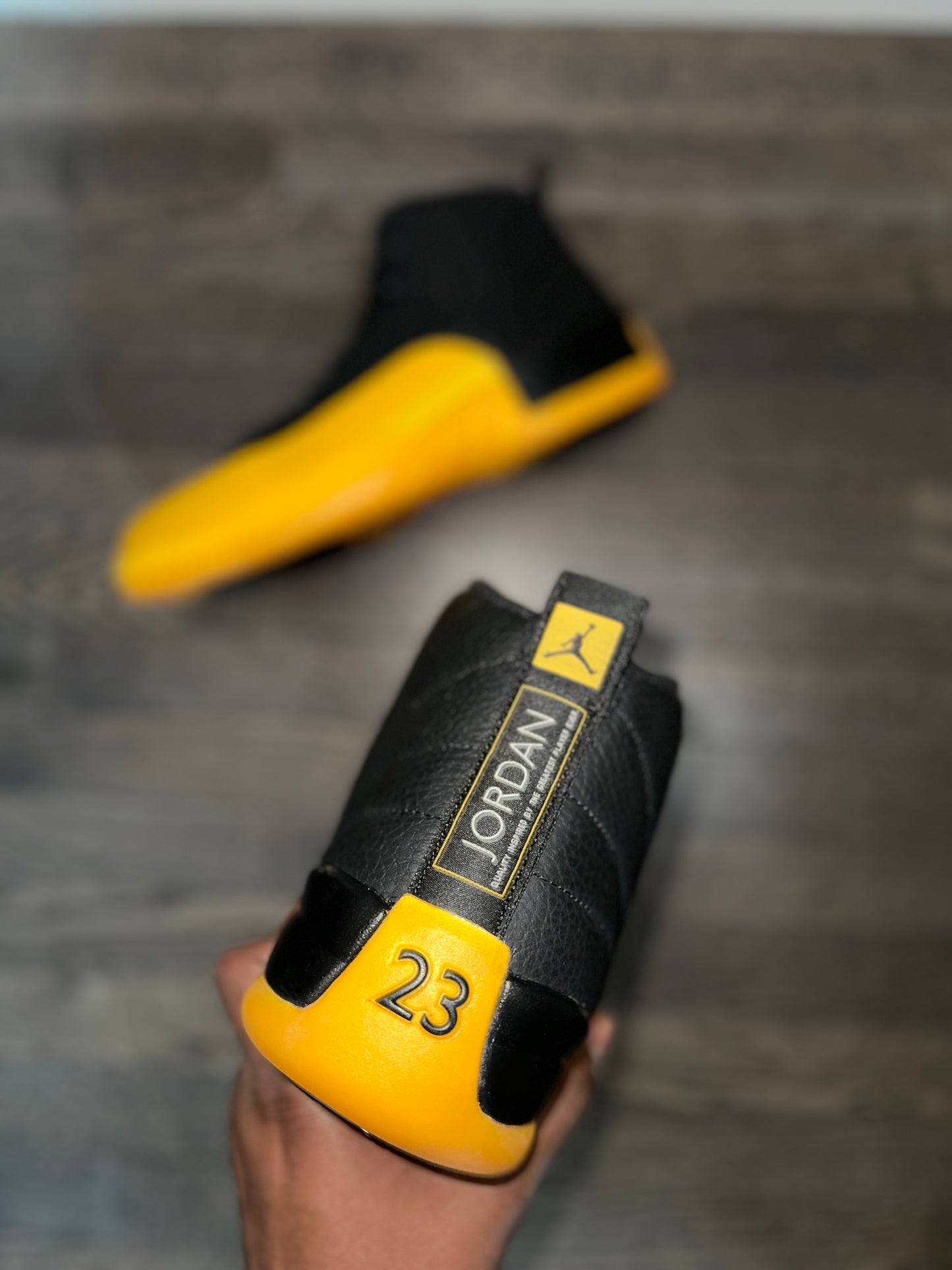 Jordan 12 Retro “Black University Gold”