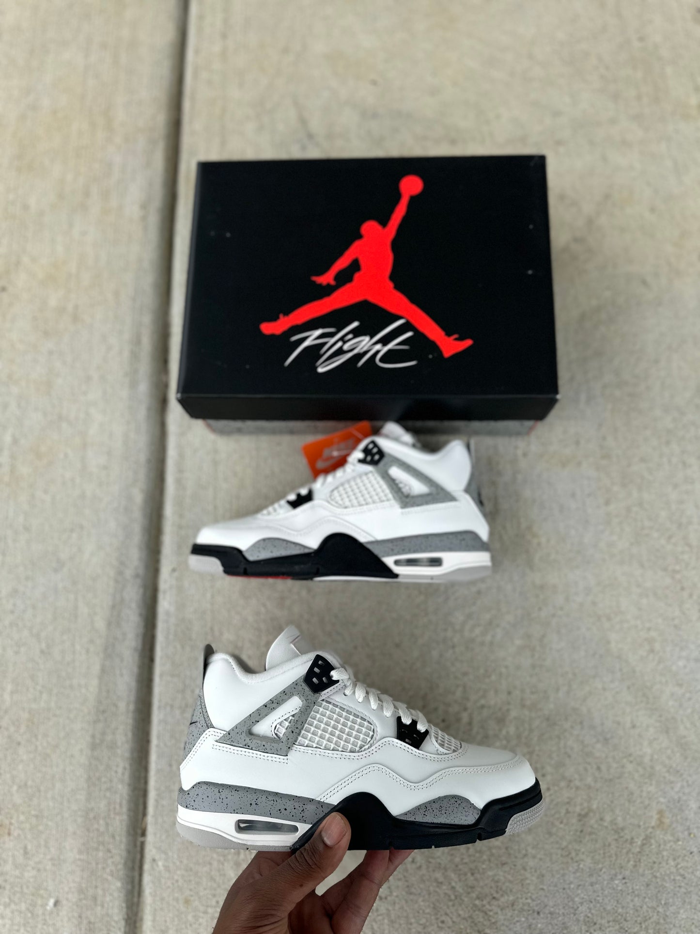 Jordan 4 Retro “White Cement” (2025)