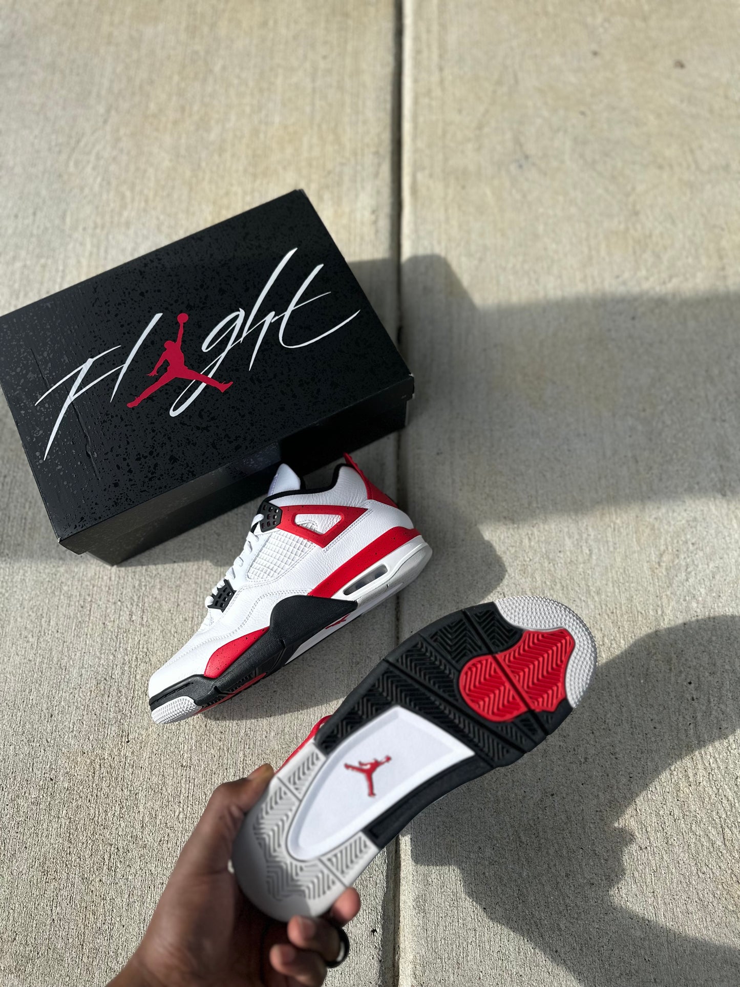 Jordan 4 Retro “Red Cement”