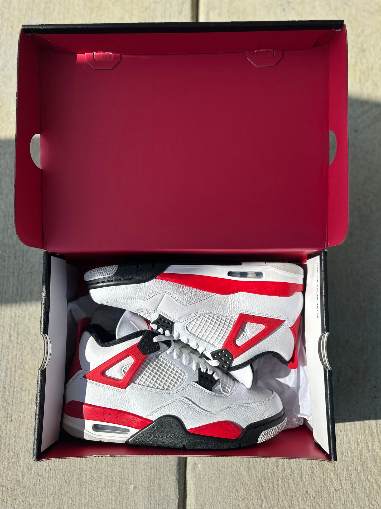 Jordan 4 Retro “Red Cement”