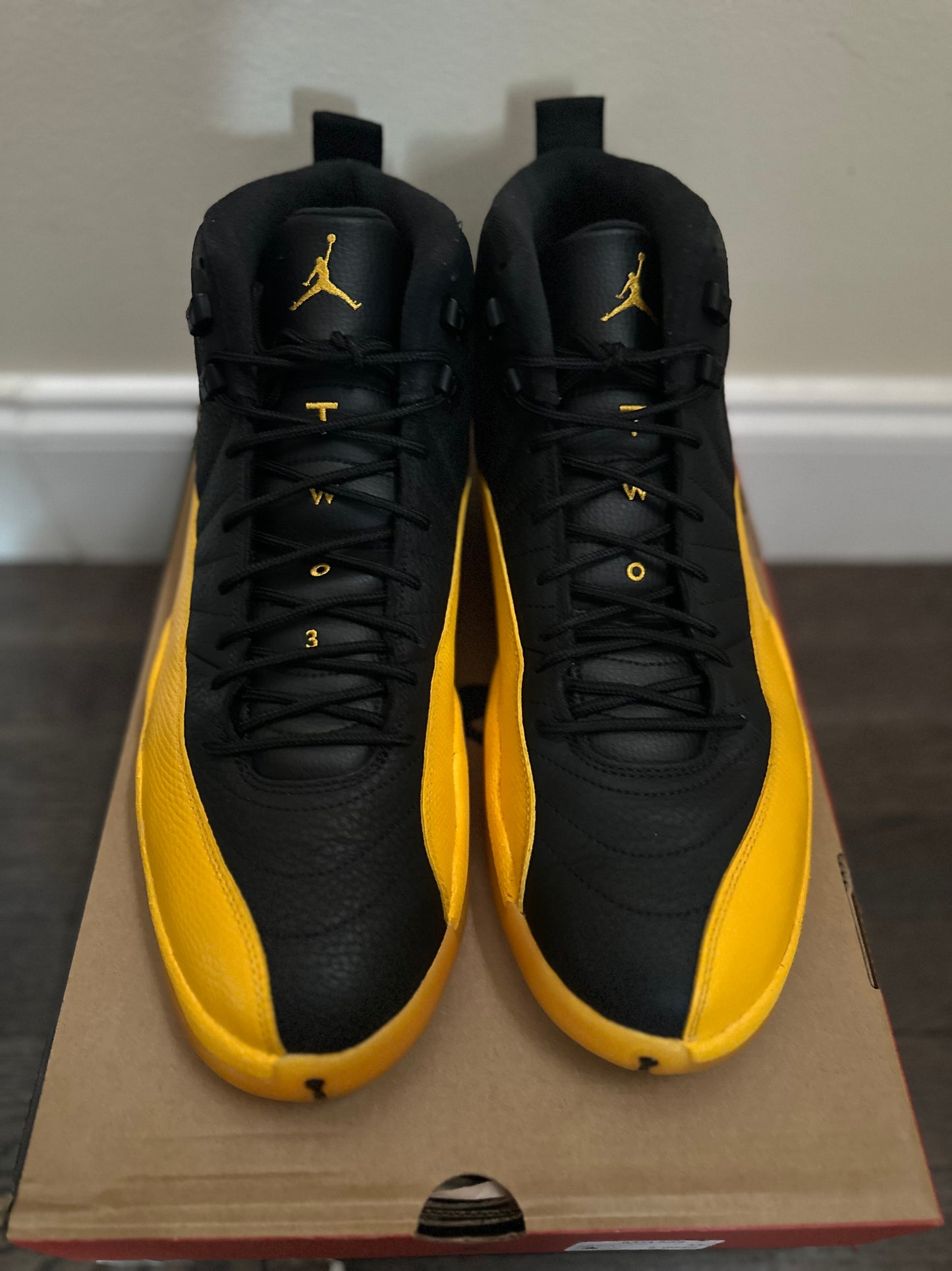 Jordan 12 Retro “Black University Gold”