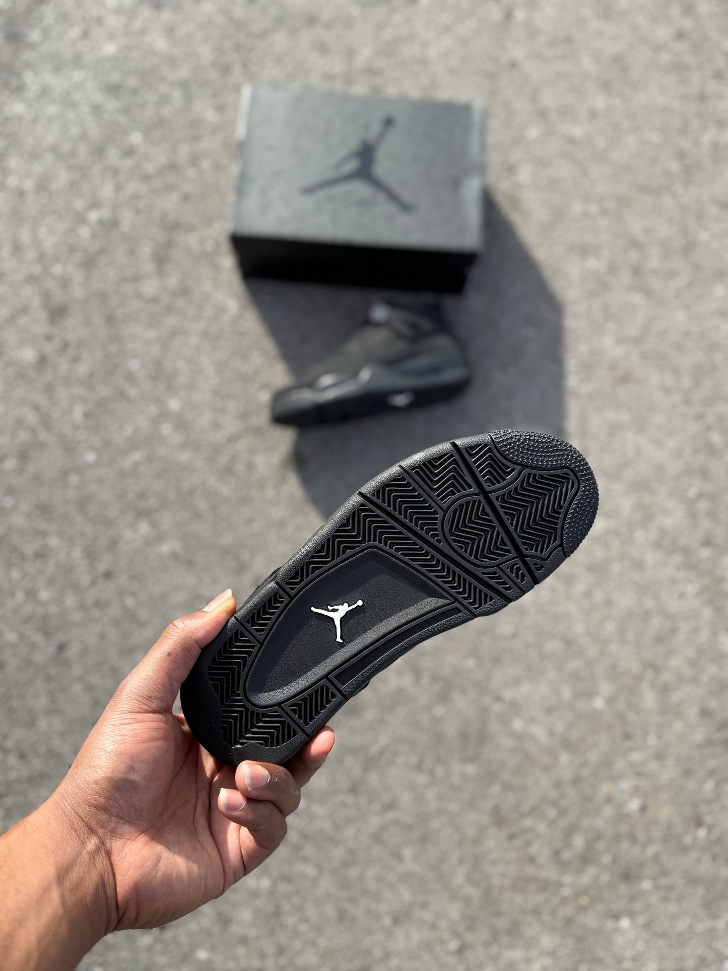 Jordan 4 Retro “Black Cat” (2025)