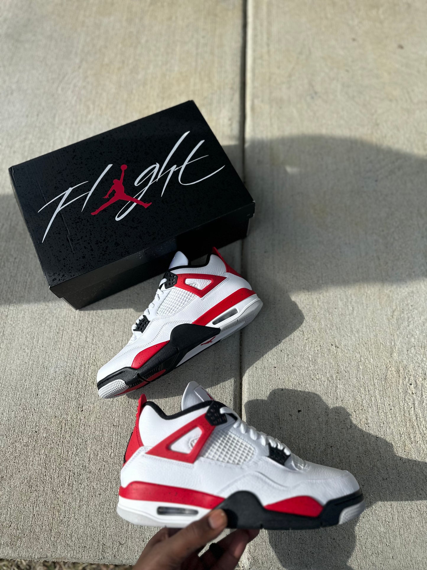 Jordan 4 Retro “Red Cement”