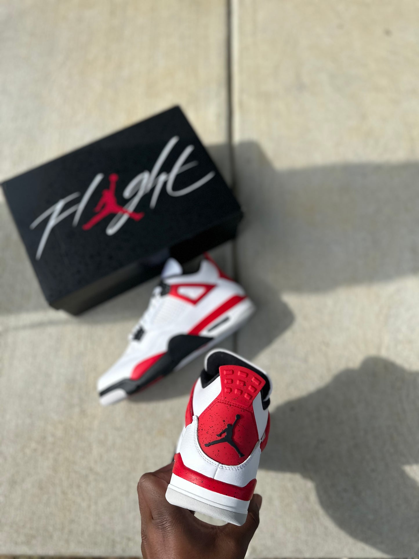 Jordan 4 Retro “Red Cement”